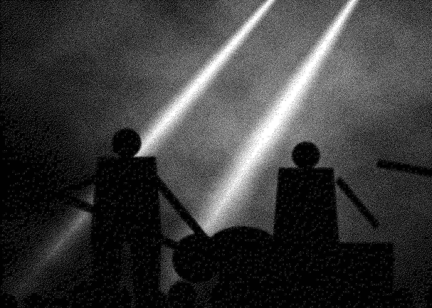 Guitarra y batería durante el final del show